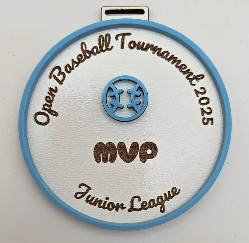 Medal made with blue pastel acrylic showing sports design